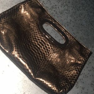Michael Kora clutch